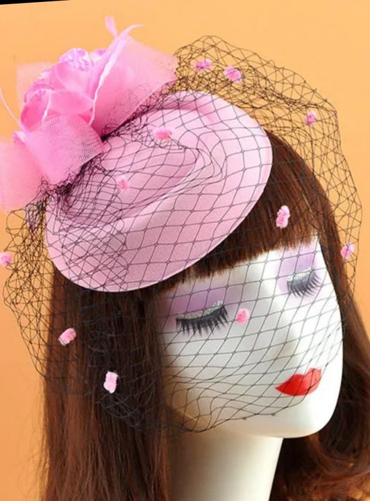 Women fascinator hats.